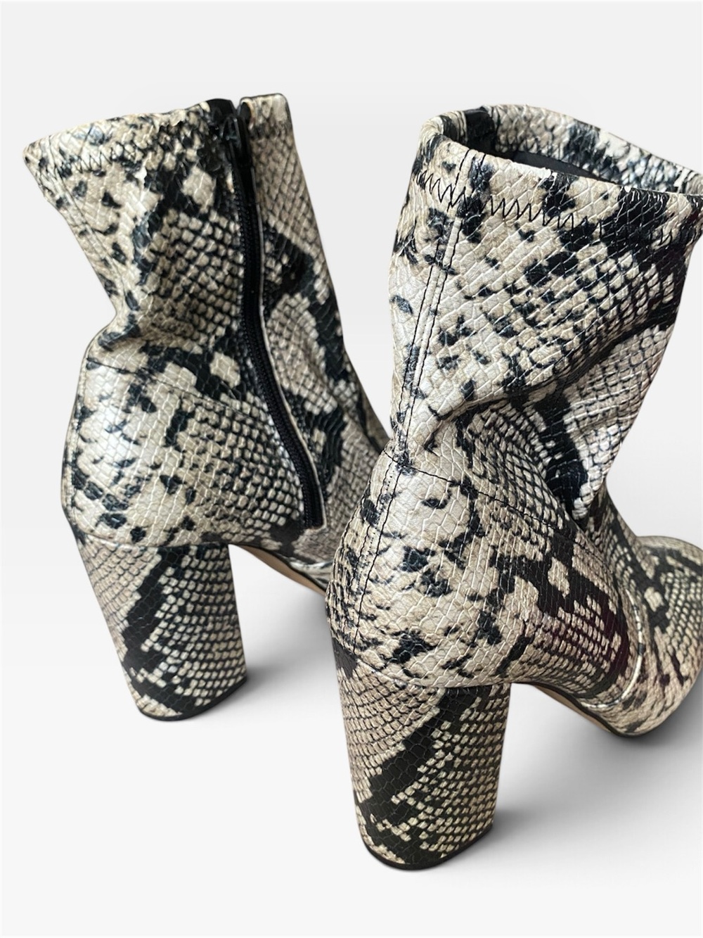 Aldo Snake-Print Ankle Boots in Black and Cream